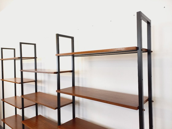 Image 1 of Vintage Italian triple modular bookcase in teak and metal from the 1960s