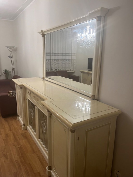 Sideboard with matching faced cut mirror