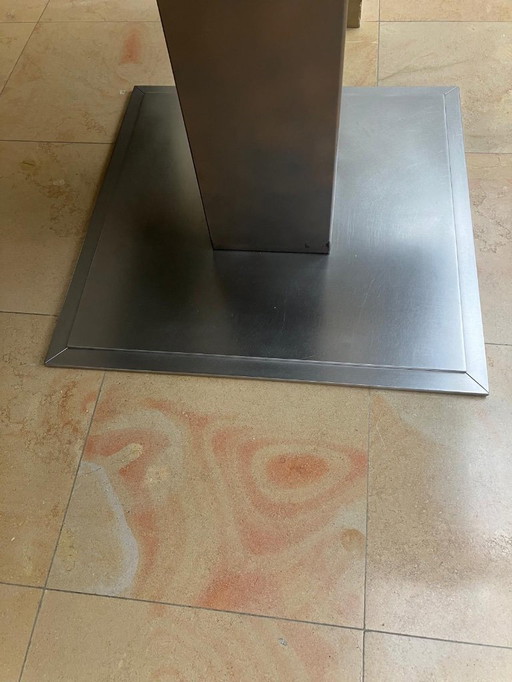 Dining table with natural stone top