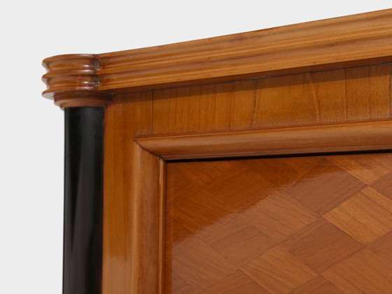Image 1 of Meuble à deux portes Jules Leleu en bois de cerisier marqueté de bronze, 1940