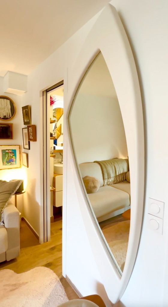 Image 1 of Very large, deconstructed Space Age wall mirror in lacquered wood. France, 1970s