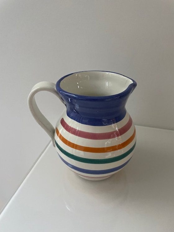 Image 1 of Handgemaakte vintage schenkkan met kleurrijke strepen