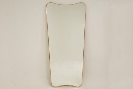 Specchio con cornice in ottone patinato. Anni '80-'90.