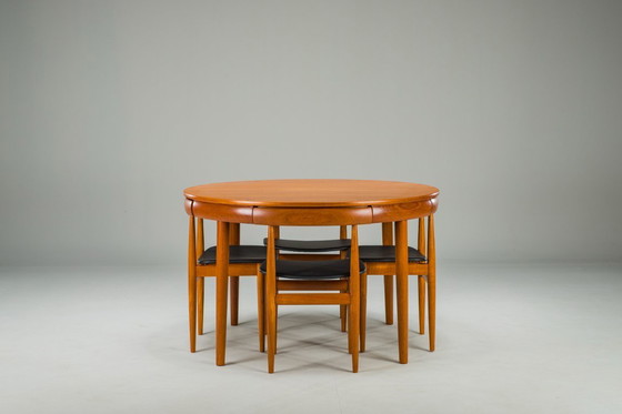 Image 1 of Mesa de comedor extensible y sillas danesas de teca de Hans Olsen para Frem Røjle, años 60, juego de 7