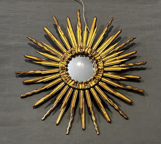 Double-sided wooden sunburst mirror with convex mirror and lamp, 1960s. Wall-mounted.