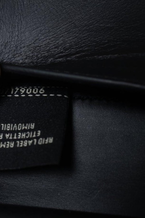 Image 1 of Fendi, pochette continentale con zip in pelle stampata FF