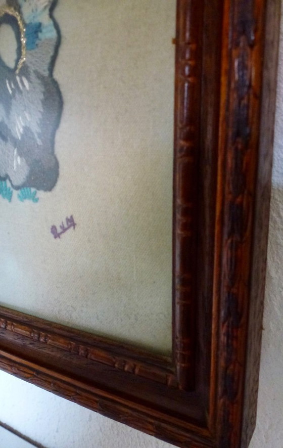 Image 1 of Vintage hand-embroidered wall tapestry, behind glass, with a crane, butterflies and flowers.