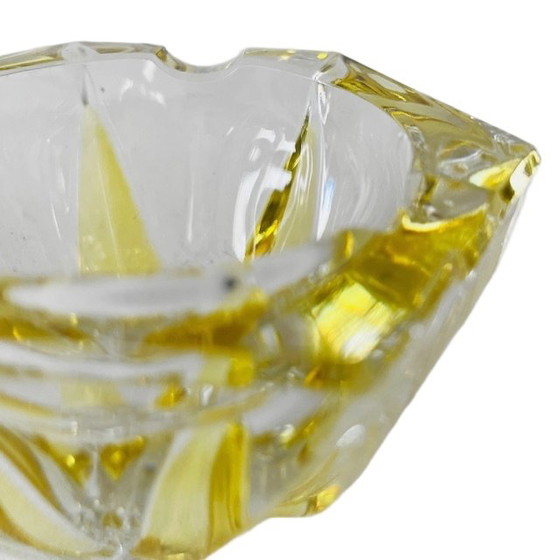 Image 1 of Zware geslepen kristallen waxinelichthouder in gele stervorm MCM 1960's