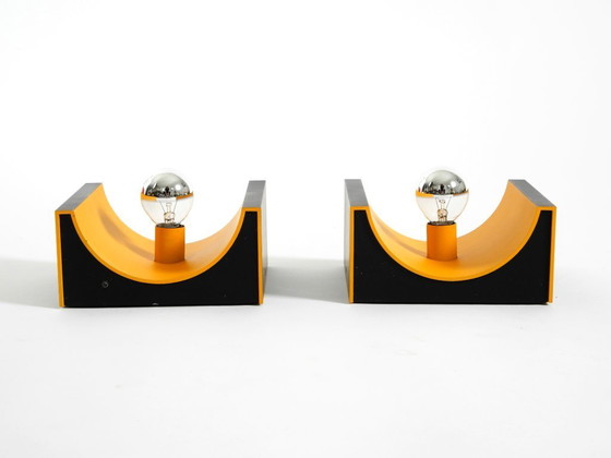 Image 1 of A rare pair of original 1960s Space Age metal wall lamps by Klaus Hempel for Kaiser Leuchten in yellow and black