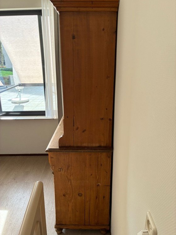 Image 1 of Mobile in pino con ante in vetro, composto da 2 parti.