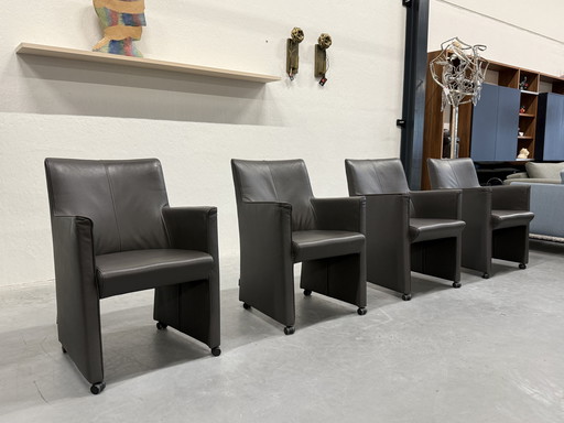 4 Jan Neggers dining chairs on wheels gray leather