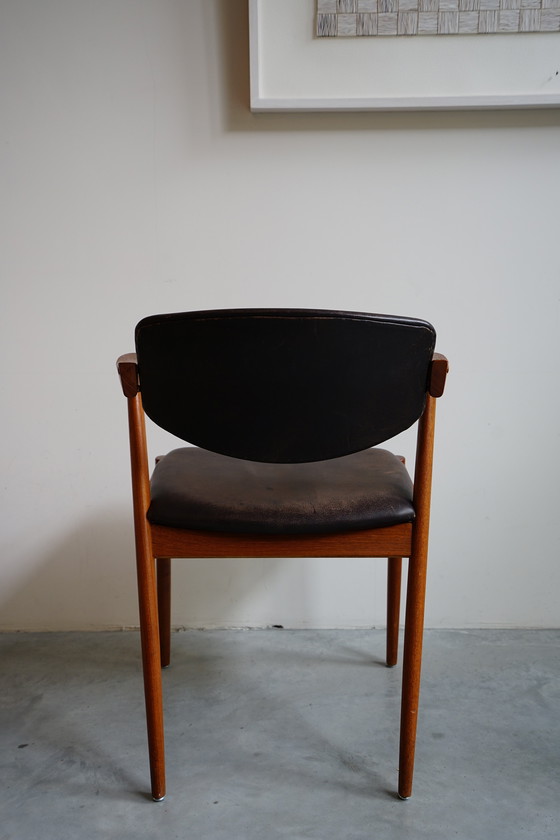 Image 1 of 6 Kai Kristiansen stoelen | Model 42 | Teak Leder patina