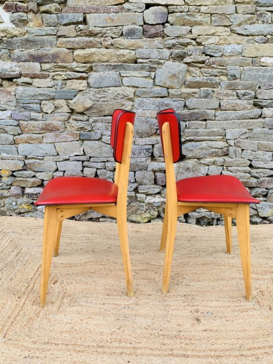 Image 1 of Ein Paar rote Stühle