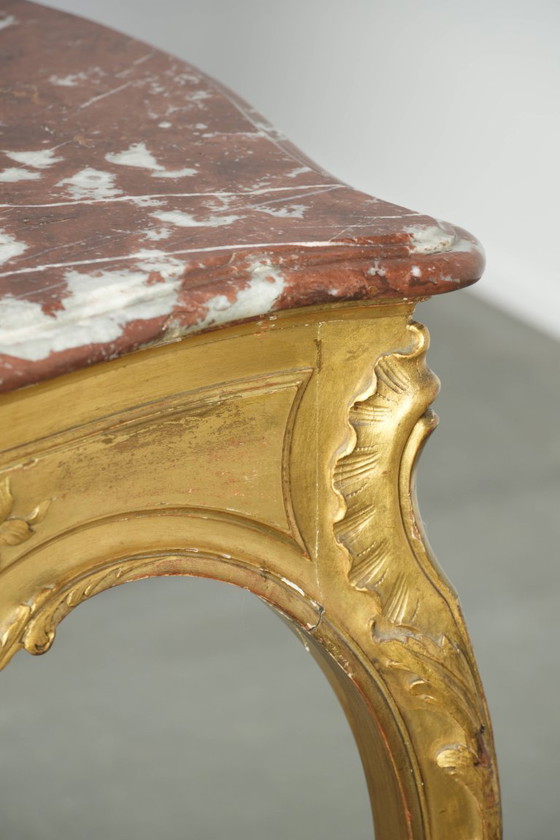 Image 1 of Antique French side table/center table from the 19th century with a gold-colored wooden frame and an original marble tabletop.