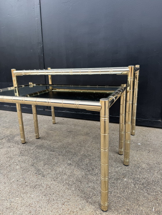 Image 1 of Nesting tables in gold-tone metal, bamboo, and mirror, 1970s style