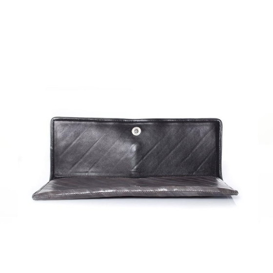 Image 1 of Maison Du Posh, pochette con anello a nocca e drago.