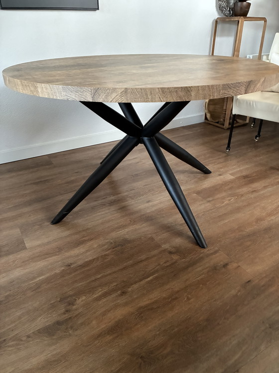 Image 1 of Round dining table with spider leg