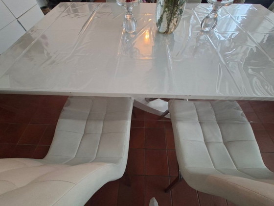 Image 1 of Dining table with chairs