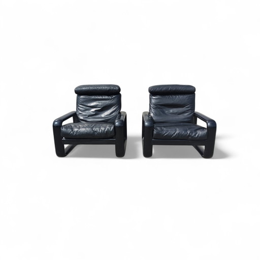 Een paar zwarte leren Rosenthal fauteuils uit de jaren 70.