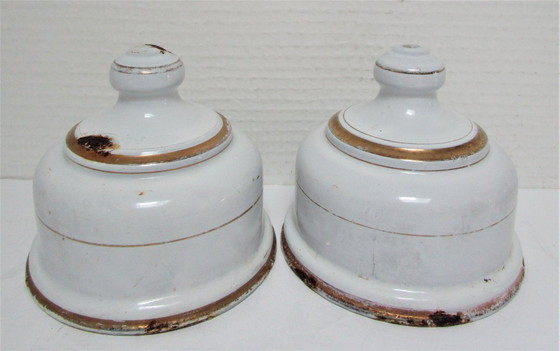 Image 1 of four enameled metal cheese bells, early 20th century