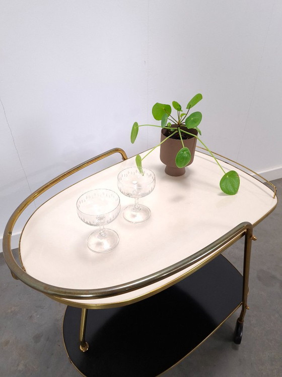 Image 1 of Ilse Möbel trolley met zwart wit formica