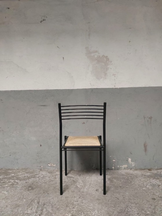Image 1 of 4 chaises en métal avec assises en osier