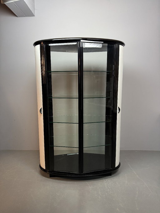 Rare Mid-Century Italian Design Glass Display Cabinet with White Leather Doors in Black Wooden Frame by Rossi di Albizatte. 