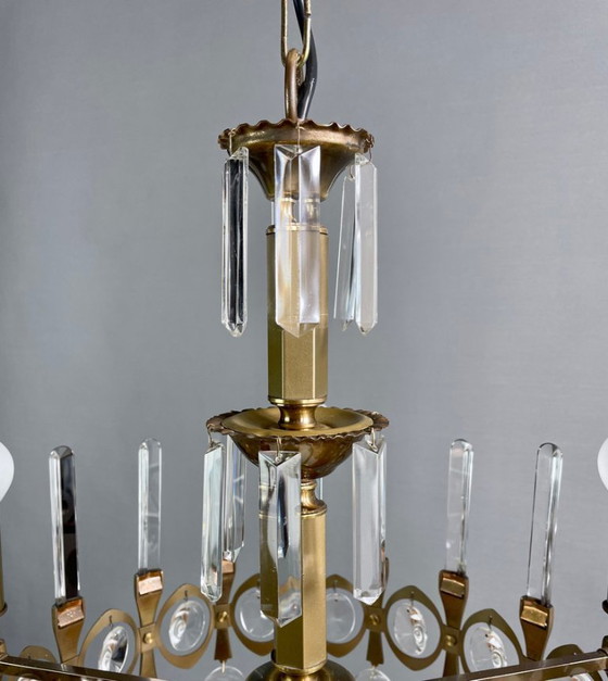 Image 1 of Gaetano Sciolari, five-light chandelier from the "Ovali" series, 1960s. Burnished brass frame and original optical crystals.