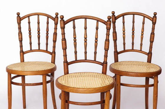 Image 1 of Set van 4 Josef Kohn gebogen houten stoelen – Oostenrijkse vintage jaren 30-50, beukenhout met Weense rieten zittingen, Thonet-s