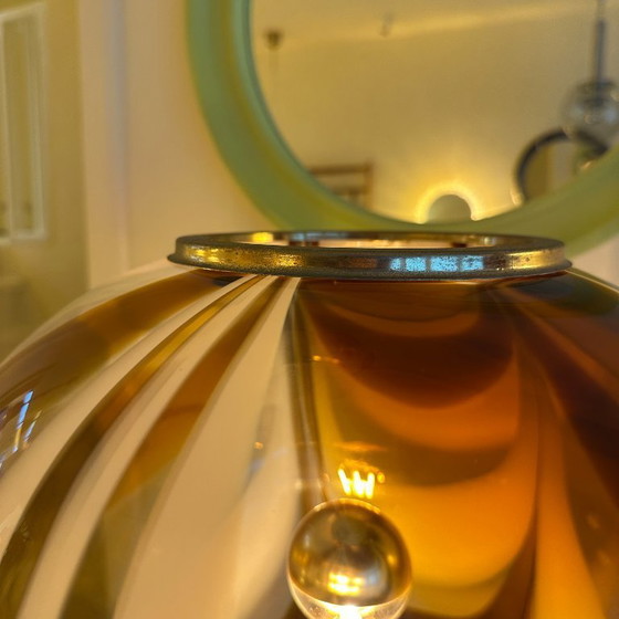 Image 1 of Italian Murano amber swirl glass globe floor lamp on brass base