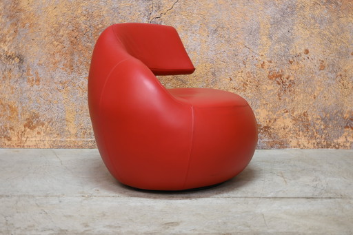 Red leather Leolux Gisa designer swivel armchair