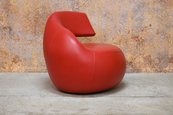 Image 1 of Red leather Leolux Gisa designer swivel armchair