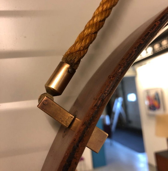 Image 1 of https://www.1stdibs.com/furniture/mirrors/wall-mirrors/pizzetti-cognac-leather-mirror-1950s-italy/id-f_33697732/