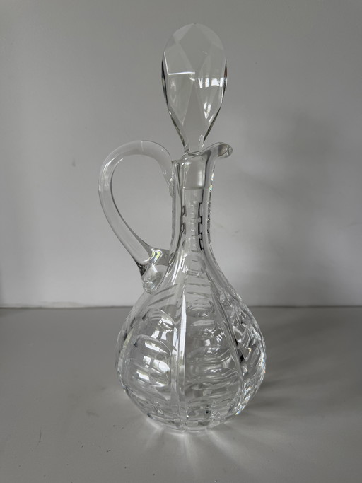 Karan en cristal rond avec main à