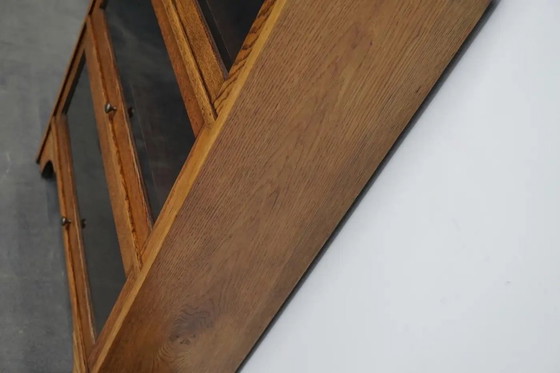 Image 1 of Duitse eiken boekenkast met schuifdeuren in de stijl van Globe Wernicke, ca. jaren 1930