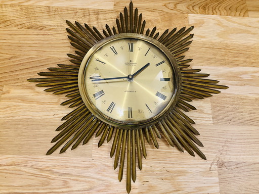 Horloge murale sunburst Junghans - Années 1960 laiton 45cm vintage