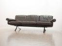 Exquisite Mid-Century Design De Sede Black Leather Strap Stitched Three-Seat Sofa DS31. Switzerland, 1960s.