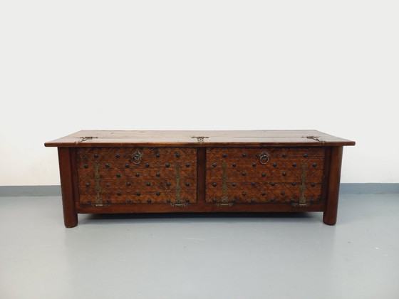 Image 1 of Een laag, brutalistisch dressoir van Georges Robert, gemaakt van donker grenenhout, uit de jaren 50/60.