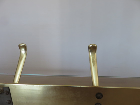 Image 1 of Large wall-mounted coat rack in gilded aluminum, France, 1970