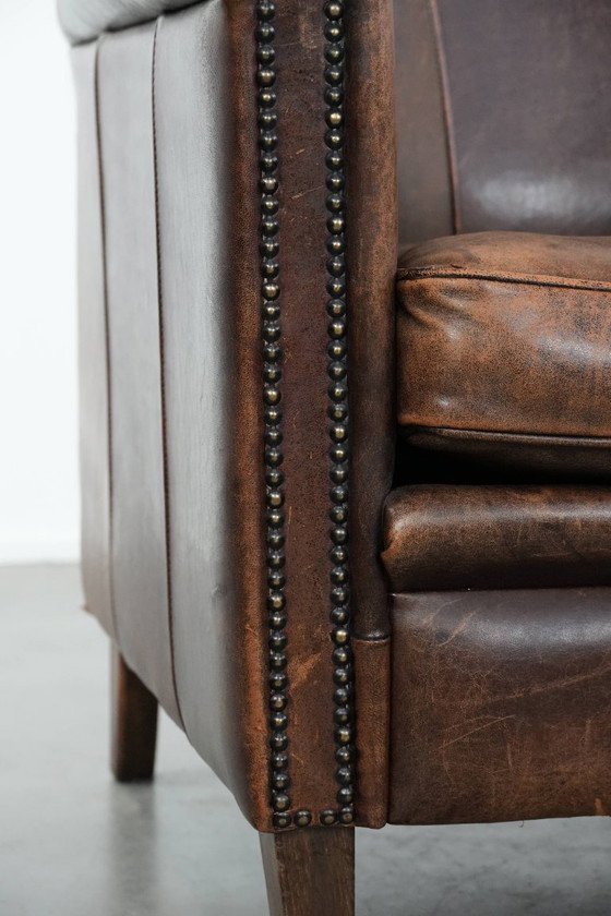 Image 1 of Fauteuil vintage en peau de mouton avec du caractère