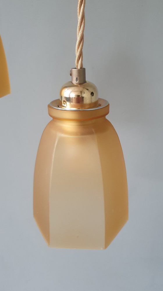 Image 1 of Set Vintage franse gele hanglampen van gekleurd glas.
