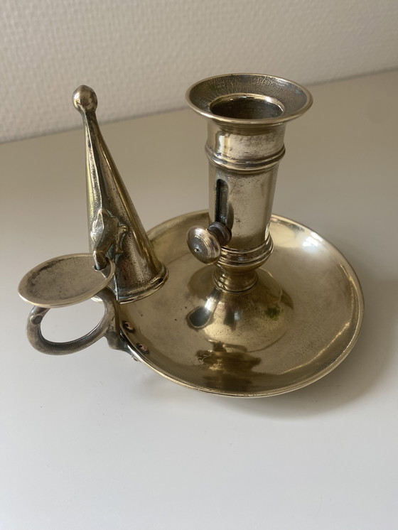 Image 1 of Antique candlestick in solid bronze