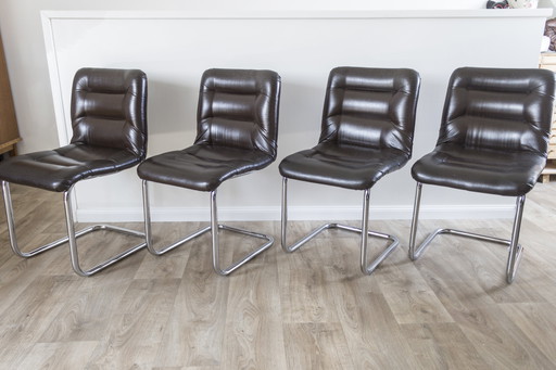 Ensemble de 4 chaises vintage à structure tubulaire - cuir skaï - style Space Age - années 1970