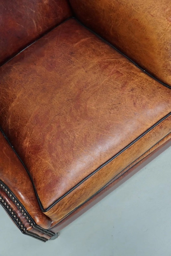 Image 1 of Vintage Nederlandse clubfauteuil in cognackleurig leer