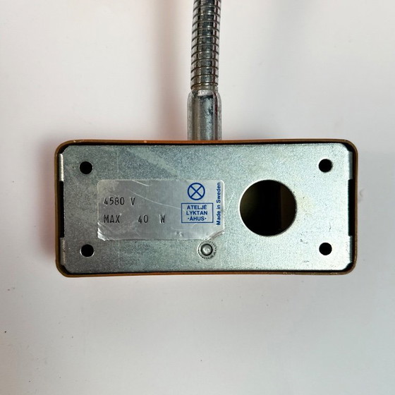 Image 1 of Coppia di lampade da parete arancioni degli anni '70 di Ateljé Lyktan