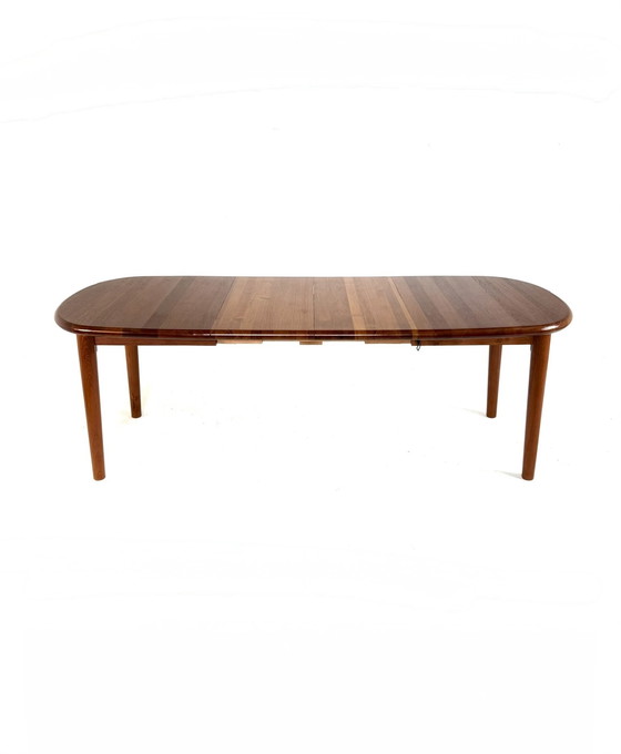 Image 1 of Vintage verlengbare Deense teakhouten eettafel ‘70