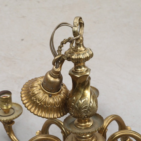 Image 1 of Antique brass chandelier dating from 1920–1930, with eight fittings, dimensions 21 cm wide, 55 cm high and 75 cm deep, in good 