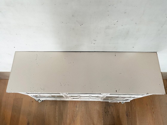 Image 1 of Vetrina vintage in metallo con 9 ante a ribalta in vetro.