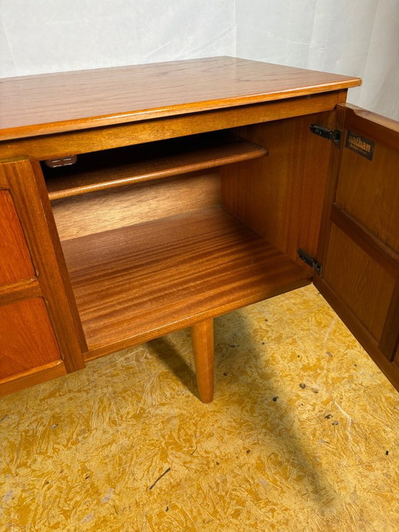 Image 1 of Mid Century Retro Teak Sideboard by Nathan Circa 1960  A classic and highly recognisable mid century modern teak sideboard by Na