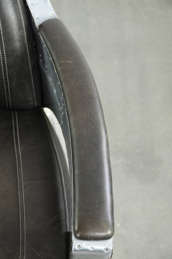 Image 1 of Fauteuil/robinet de style aviateur unique et confortable en cuir de vachette, finitions aluminium et rivets